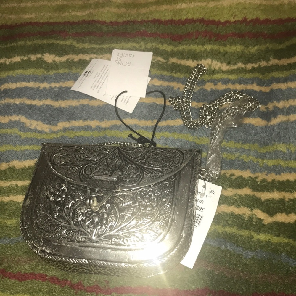 From St Xavier Riley Clutch